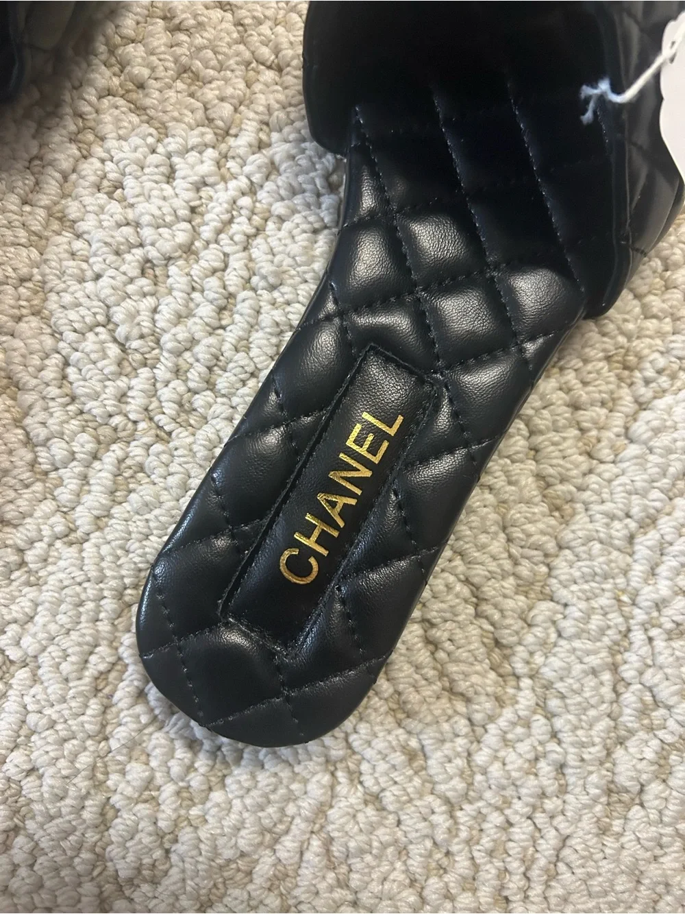 CHANEL Black Quilted Leather Slide Mules with Gold CC Chain